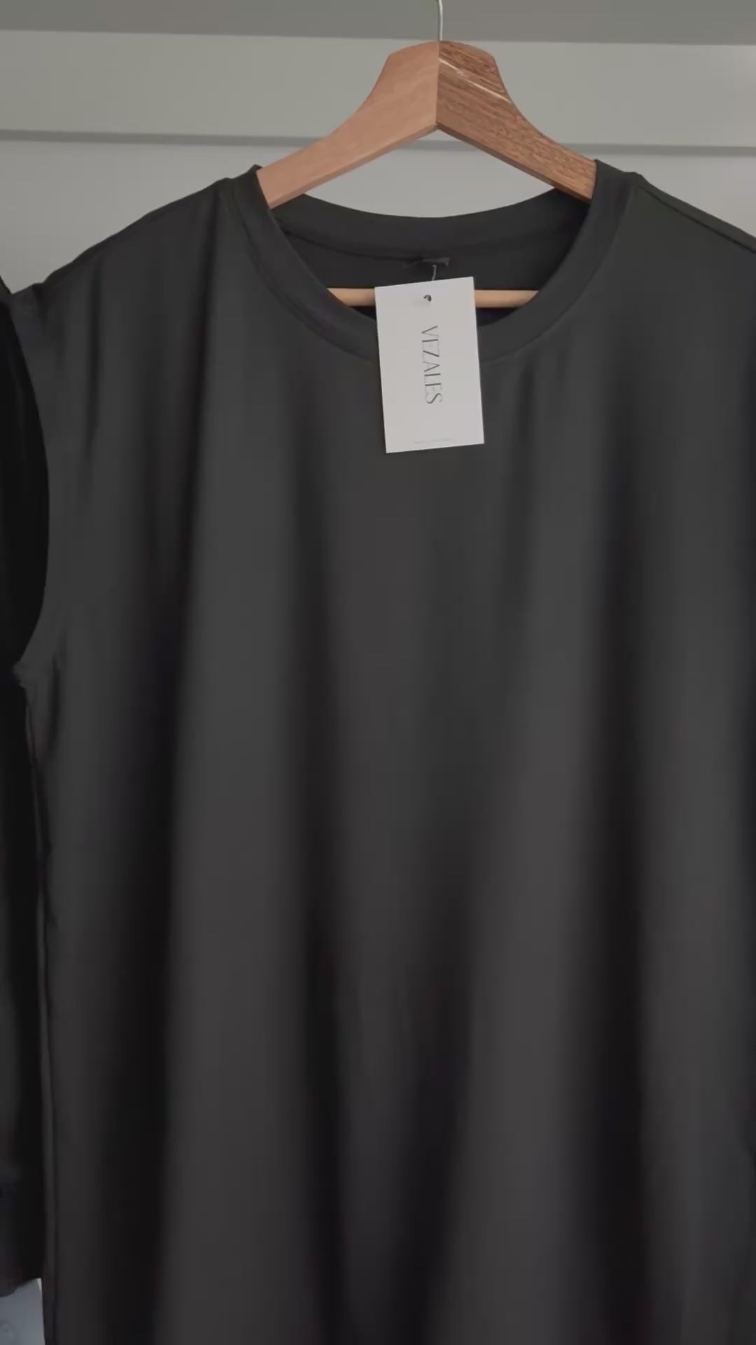 Polo Oversize Sin Mangas Negro – Estilo Urbano